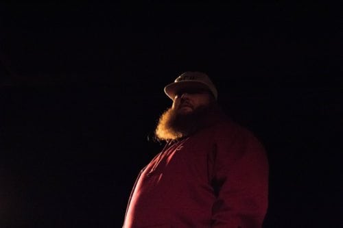 Action Bronson smokes