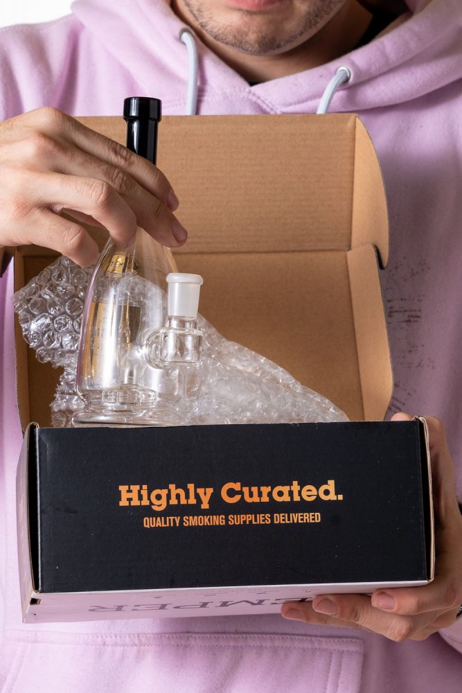 Hennything Is Possible With Hemper’s Cannabis Accessories Subscription Box with henny bottle bong