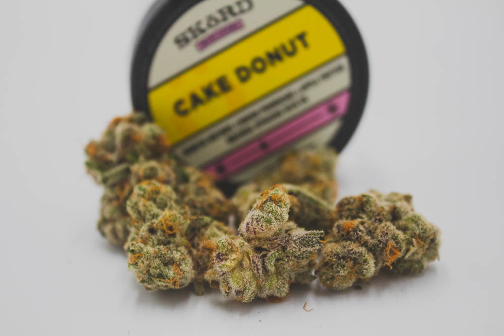 best strain in washington cake donut weed with lid in background