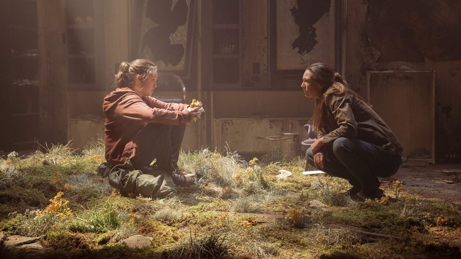 Bella Ramsey as Ellie and Anna Torv as Tess in HBO's The Last of Us.