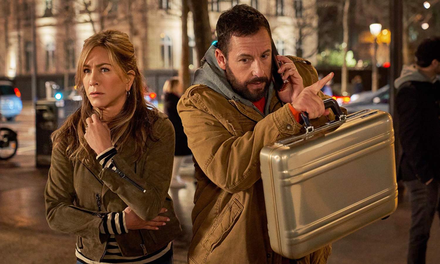 Jennifer Aniston as Audrey Spitz and Adam Sandler as Nick Spitz in Netflix's original film Murder Mystery 2