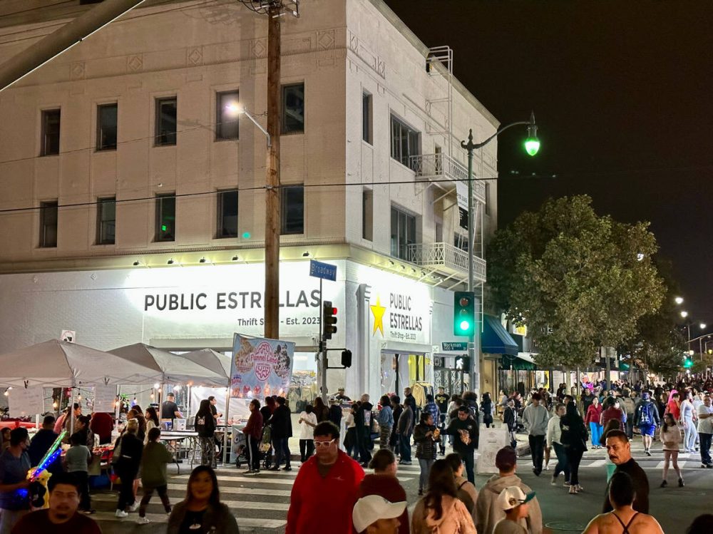 People gather on the street at the Public Estrellas first bazaar.