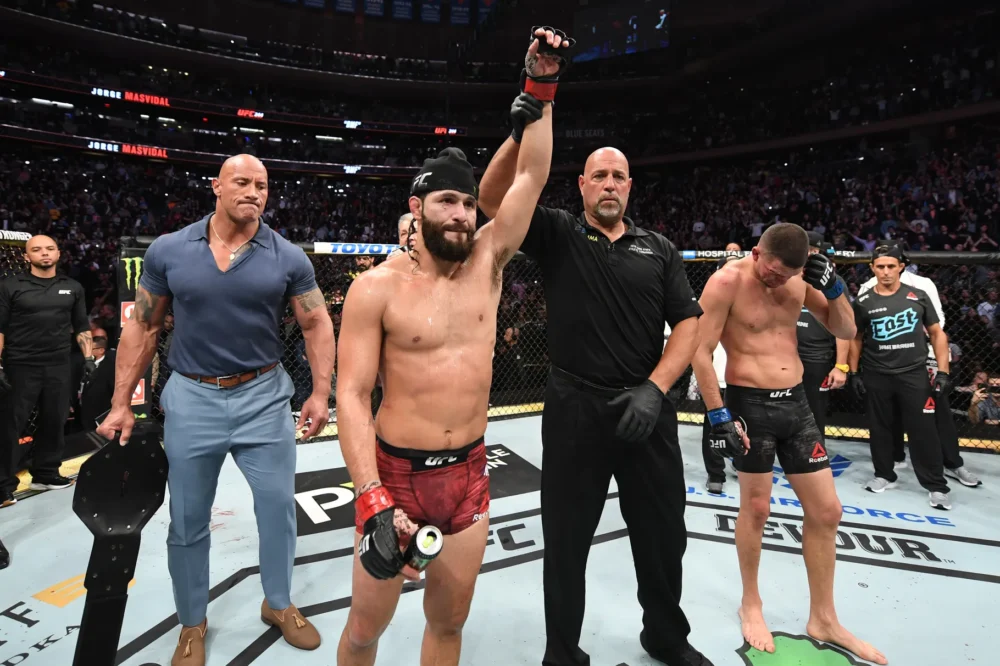 UFC superstar Jorge Masvidal defeated Nate Diaz via third-round doctor's stoppage for the BMF title at UFC 244.