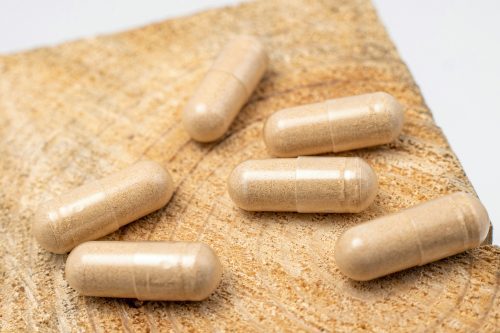 OPMS Kratom At NuWave Botanicals: Explore The Most Popular Capsules --Photo by Supliful - Supplements On Demand on Unsplash